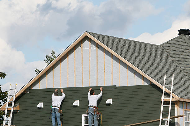 Professional Siding technician working in Newton, TX